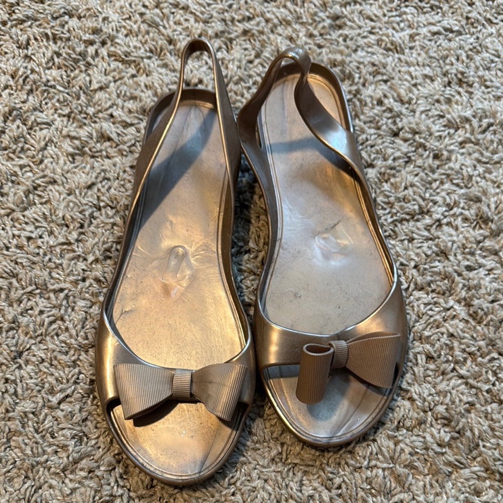 Kate Spade Silver Flats with Sleek Design